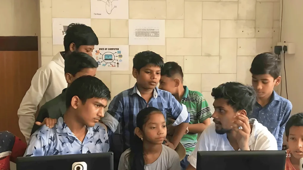 A mentor interacting with students in a microschool in India in 2025.