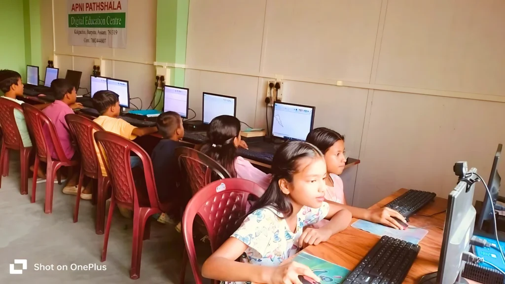 Students getting access to personal computers in ApniPathshala’s learning pod.