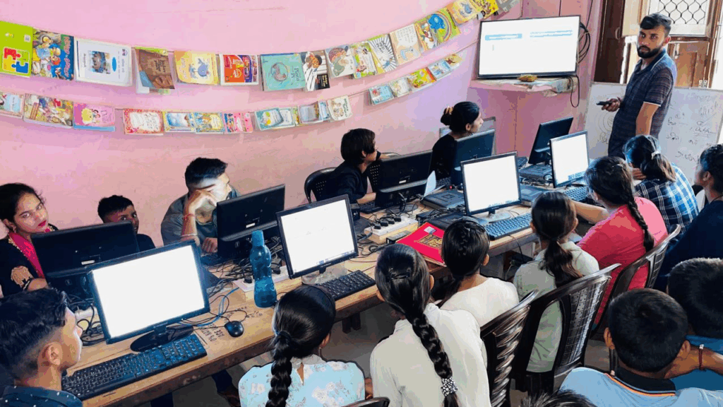 An educator teaching students in a community microschool in Haryana
