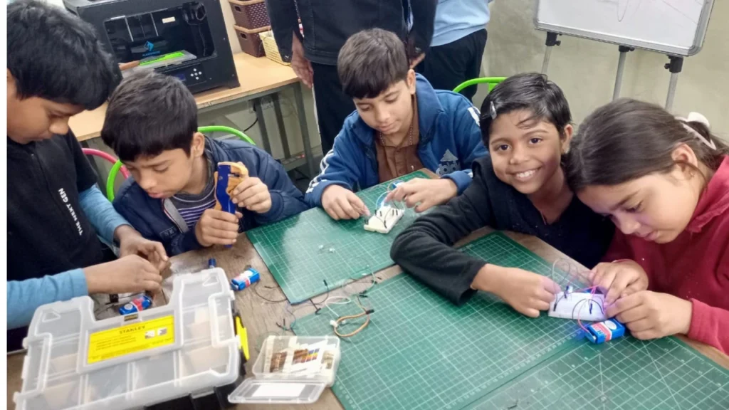 Students studying together in a Community Learning Centre POD