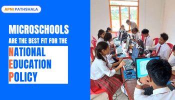 Image showing students in a microschool using computers, highlighting how microschools align with NEP 2020 through small class sizes, personalized learning, and technology integration.